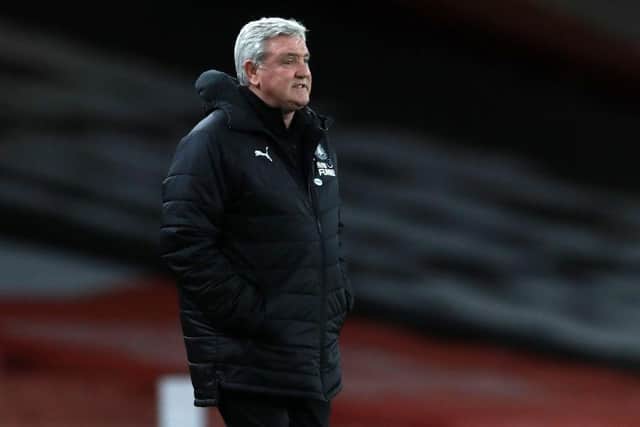 Newcastle United's English head coach Steve Bruce watches his players from the touchline during the English Premier League football match between Arsenal and Newcastle United at the Emirates Stadium in London on January 18, 2021. (Photo by Adam Davy / POOL / AFP) / RESTRICTED TO EDITORIAL USE. No use with unauthorized audio, video, data, fixture lists, club/league logos or 'live' services. Online in-match use limited to 120 images. An additional 40 images may be used in extra time. No video emulation. Social media in-match use limited to 120 images. An additional 40 images may be used in extra time. No use in betting publications, games or single club/league/player publications. /  (Photo by ADAM DAVY/POOL/AFP via Getty Images)
