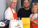 Greer and Linda Morrison, volunteers at Horsley Hill community shop with  Mark Patterson, community champion at Morrisons South Shields