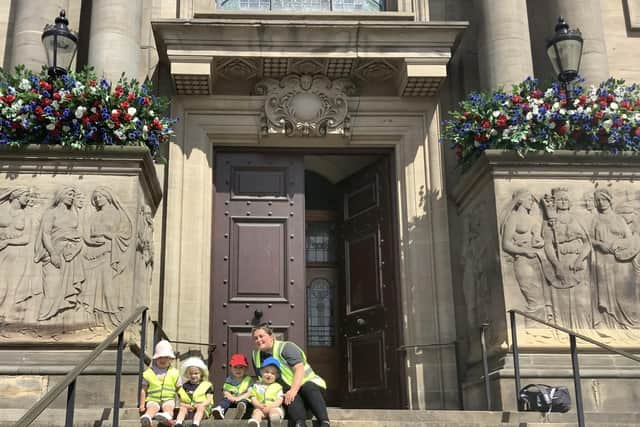 Some of the youngsters on the steps at the Town Hall.