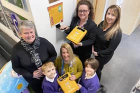 Hebburn Lakes primary school pupils Coen Isherwood and Felicia Ekroth present a Defibrillator to Judith Reay headteacher at Sue Hedley Nursery. Looking on are Hebburn Lakes parents Sarah Summerhill (left) and Michelle Butler (right, with Amanda Moody the Headteacher at Hebburn Lakes who is holding a Defibrillator that has been installed at the school.