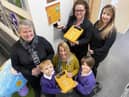 Hebburn Lakes primary school pupils Coen Isherwood and Felicia Ekroth present a Defibrillator to Judith Reay headteacher at Sue Hedley Nursery. Looking on are Hebburn Lakes parents Sarah Summerhill (left) and Michelle Butler (right, with Amanda Moody the Headteacher at Hebburn Lakes who is holding a Defibrillator that has been installed at the school.