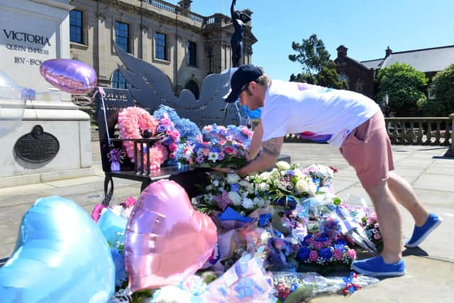 Tributes for Chloe Rutherford and Liam Curry left at their memorial bench outside of South Shields Town Hall.