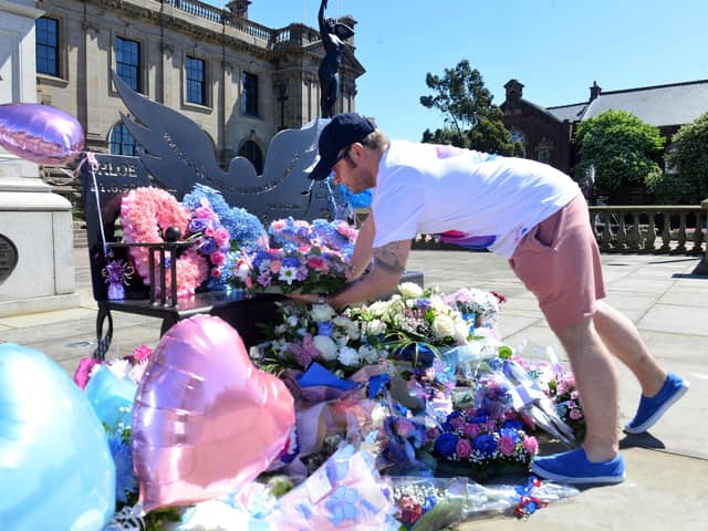 Tributes for Chloe Rutherford and Liam Curry left at their memorial bench outside of South Shields Town Hall.