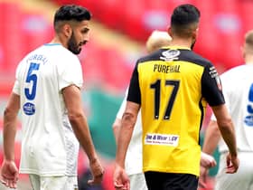 Consett's Arjun Purewal (left) and Hebburn Town's Amar Purewal during the Buildbase FA Vase 2019/20 Final at Wembley Stadium, London. PA pic.