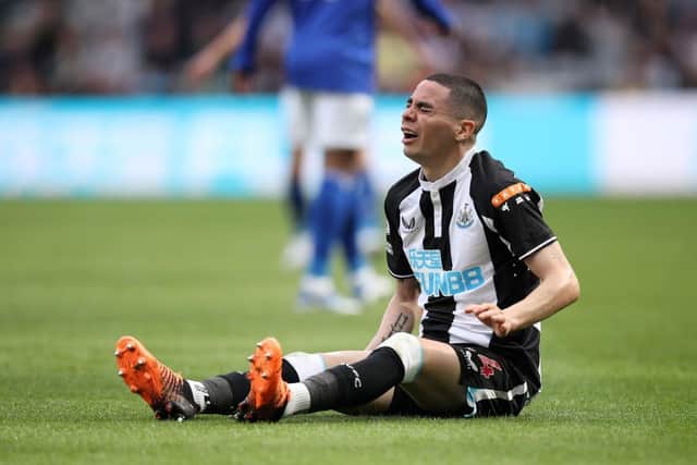 Miguel Almiron reacts during the game.