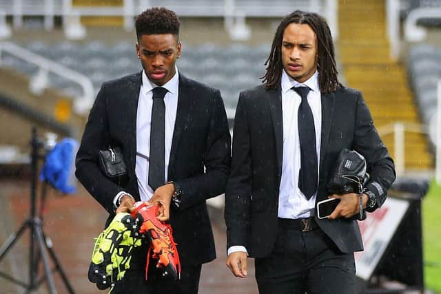 Ivan Toney (L) and Kevin Mbabu of Newcastle United arrive prior to the Barclays Premier League match between Newcastle United and Everton at St James' Park on December 26, 2015 in Newcastle upon Tyne, England.  (Photo by Ian MacNicol/Getty Images)