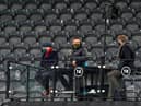 Joe Cole, Jermaine Jenas and Jake Humphrey are seen sitting in the BT Studios box (Photo by Owen Humphreys - Pool/Getty Images)