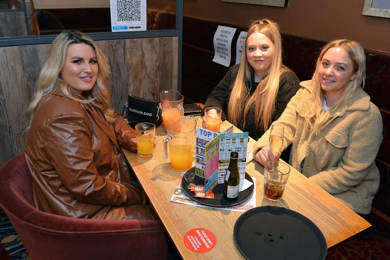 Harriet Whiteley, Rosie Bowan and Chloe Watts meet up inside Spa Lane Vaults for cocktails.