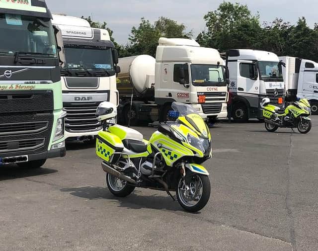 Police motorbikes and HGVs during the recent operation to check that vehicles were transporting dangerous goods safely and legally.