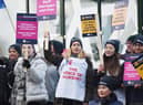 Nurses braving freezing temperatures to form a picket line.