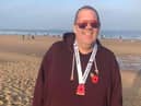 Wayne pictured at the end of his Poppy Run last year when he managed 5k.