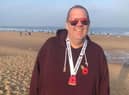 Wayne pictured at the end of his Poppy Run last year when he managed 5k.