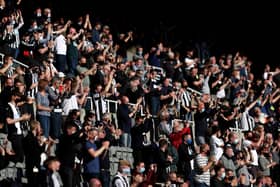 Fans show their support during the Premier League match between Newcastle United and Sheffield United at St James Park.