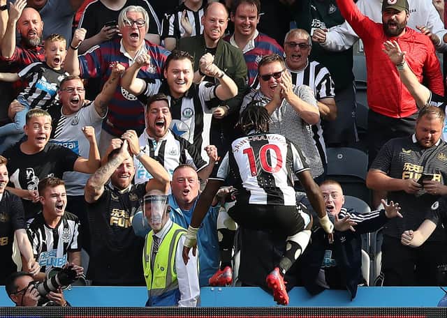 NEWCASTLE UPON TYNE, ENGLAND - AUGUST 28: Allan Saint-Maximin of Newcastle United scores his teams second goal during the Premier League match between Newcastle United  and  Southampton at St. James Park on August 28, 2021 in Newcastle upon Tyne, England. (Photo by Ian MacNicol/Getty Images)