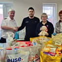 Tattoo artist Simon from Ink Driver drops off donations