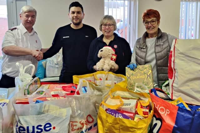 Tattoo artist Simon from Ink Driver drops off donations