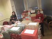 Lauren Hunter and Emma Whitelock, ACTS staff members with last year's shoe boxes