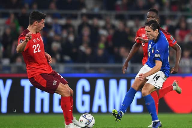 Fabian Schar's Switzerland qualified for the World Cup thanks to help from Northern Ireland's Jamal Lewis (Photo by Claudio Villa/Getty Images)