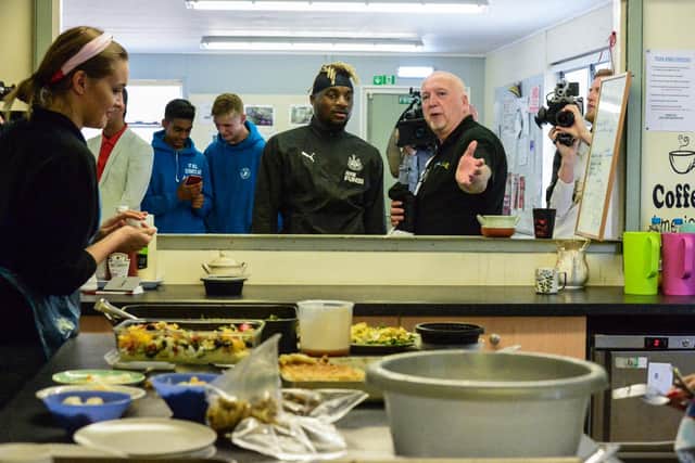 Allan Saint-Maximin visits the Newcastle West End Foodbank in August 2019.