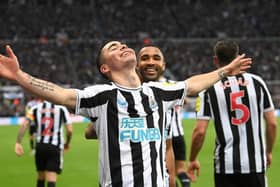 Goalscorer Miguel Almiron celebrates after scoring the fourth Newcastle goal with Callum Wilson during the Premier League match between Newcastle United and Aston Villa at St. James Park on October 29, 2022 in Newcastle upon Tyne, England. (Photo by Stu Forster/Getty Images)
