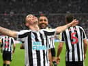 Goalscorer Miguel Almiron celebrates after scoring the fourth Newcastle goal with Callum Wilson during the Premier League match between Newcastle United and Aston Villa at St. James Park on October 29, 2022 in Newcastle upon Tyne, England. (Photo by Stu Forster/Getty Images)