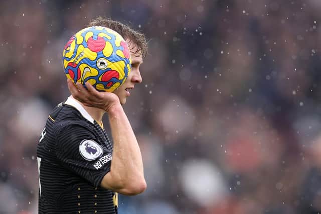 Emil Krafth of Newcastle United prepares to take a throw in during the Premier League match between West Ham United and Newcastle United at London Stadium on February 19, 2022 in London, England. (Photo by Warren Little/Getty Images)