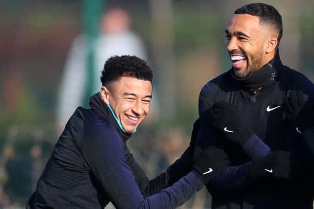 Jesse Lingard and Callum Wilson of England laugh during the England Training Session at Tottenham Hotspur Training Centre on November 17, 2018 in Enfield, England. (Photo by Catherine Ivill/Getty Images)