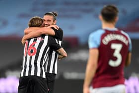 Jeff Hendrick, left, celebrates scoring Newcastle United's second goal with Andy Carroll.