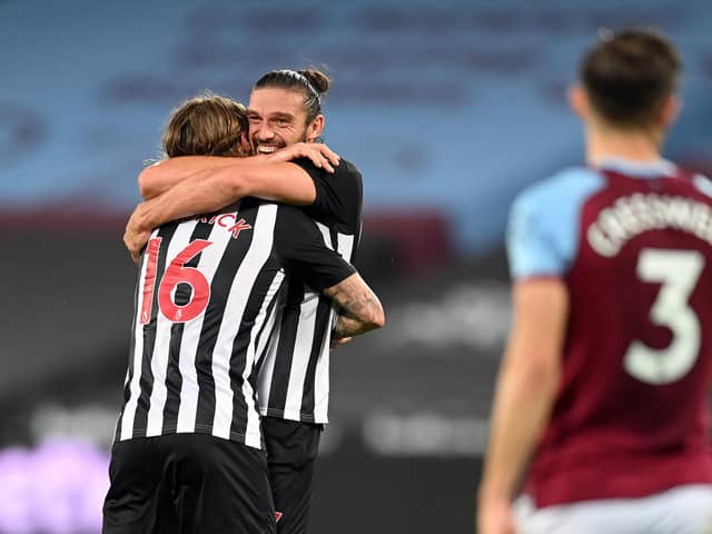Jeff Hendrick, left, celebrates scoring Newcastle United's second goal with Andy Carroll.