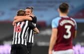 Jeff Hendrick, left, celebrates scoring Newcastle United's second goal with Andy Carroll.