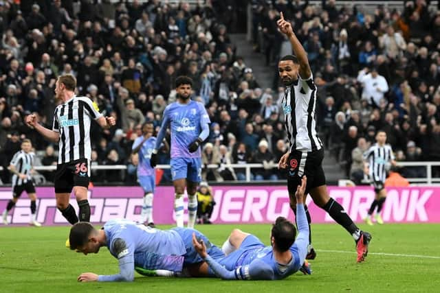 Callum Wilson of Newcastle United celebrates after Adam Smith of AFC Bournemouth scores an own goal during the Carabao Cup Fourth Round match between Newcastle United and AFC Bournemouth at St James' Park on December 20, 2022 in Newcastle upon Tyne, England. (Photo by Stu Forster/Getty Images)