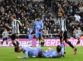 Callum Wilson of Newcastle United celebrates after Adam Smith of AFC Bournemouth scores an own goal during the Carabao Cup Fourth Round match between Newcastle United and AFC Bournemouth at St James' Park on December 20, 2022 in Newcastle upon Tyne, England. (Photo by Stu Forster/Getty Images)
