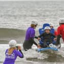 Children from St Oswald's Hospice, taking part in South Shields Surf CIC for their last session of the season on Thursday afternoon. Keira Moore on the adapted surf board