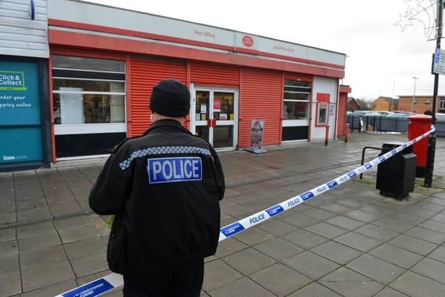 Police cordoned off the shop