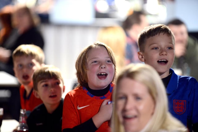 Happy young fans as England cruise to victory.