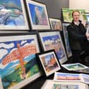 Guy Macklam from Miller Auctioneers alongside John Coatsworth art collection