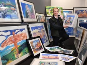 Guy Macklam from Miller Auctioneers alongside John Coatsworth art collection