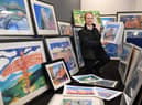 Guy Macklam from Miller Auctioneers alongside John Coatsworth art collection