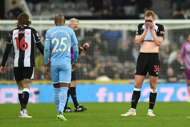 Sean Longstaff of Newcastle United looks dejected. (Photo by Stu Forster/Getty Images).