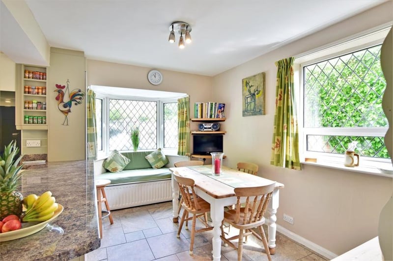 The breakfasting nook has a bay window and a box seating area