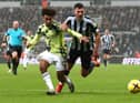 Tyler Adams of Leeds United challenges Fabian Schar of Newcastle United during the Premier League match between Newcastle United and Leeds United at St. James Park on December 31, 2022 in Newcastle upon Tyne, England. (Photo by George Wood/Getty Images)