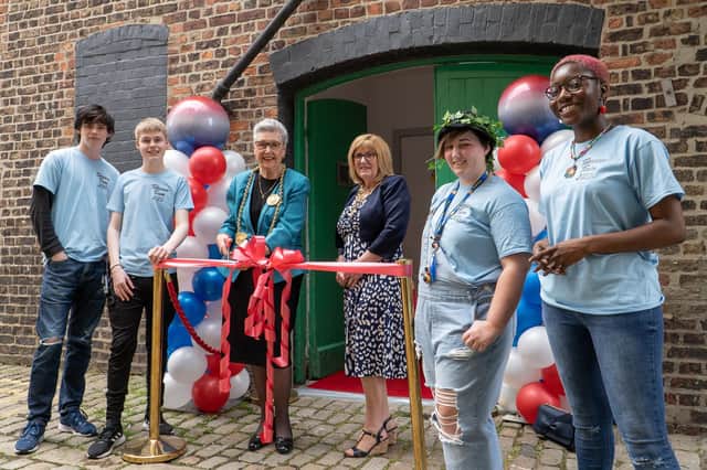 The Mayor and Mayoress with some of the young people who will benefit from the hub.
