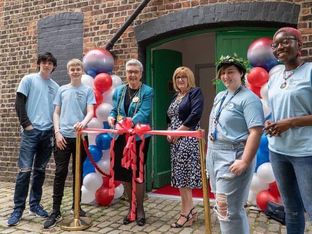 The Mayor and Mayoress with some of the young people who will benefit from the hub.