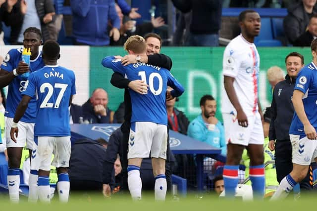 Anthony Gordon of Everton celebrates after scoring their team's second goal with Frank Lampard, Manager of Everton during the Premier League match between Everton FC and Crystal Palace at Goodison Park on October 22, 2022 in Liverpool, England. (Photo by Naomi Baker/Getty Images)