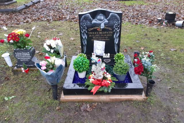 The grave of Violet Redpath which has been targeted by thieves and vandals.