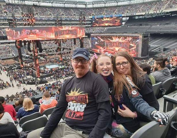 Julie and her husband Chris, along with daughter Jess at Wrestle Mania.
