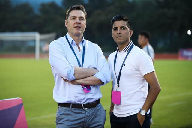 NANJING, CHINA - JULY 15:  Richard Masters (L) Premier League Interim Chief Executive, with Manish Bhasin, presenter PLP attend the finals the of CSL Cup Youth Tournament match between Jiangsu Suning and Shanghai Shenhua at Jiangsu FA Training Complex on July 15, 2019 in Nanjing, China.  (Photo by Lintao Zhang/Getty Images for Premier League)