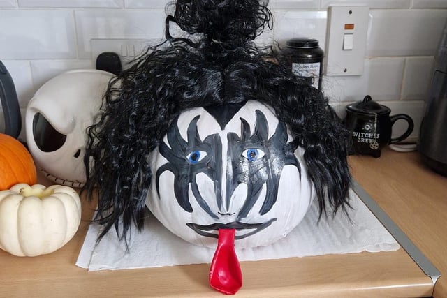 Gene Simmons makes an appearance on a pumpkin. Celebrating National Pumpkin Day and Halloween with Rachel Coates.