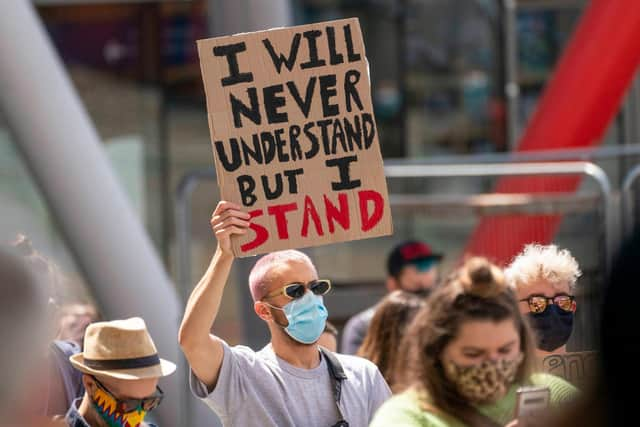 Demonstrators stage a peaceful protest at Times Square in Newcastle. Picture: North News.