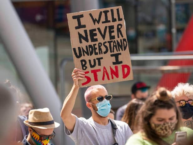 Demonstrators stage a peaceful protest at Times Square in Newcastle. Picture: North News.